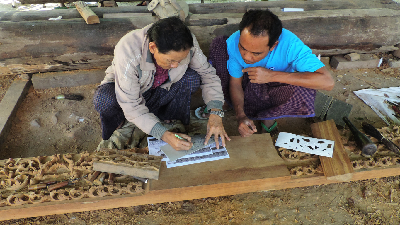 U Kan Khyun and Ko Phone Kyaw prepare stencil drawings.