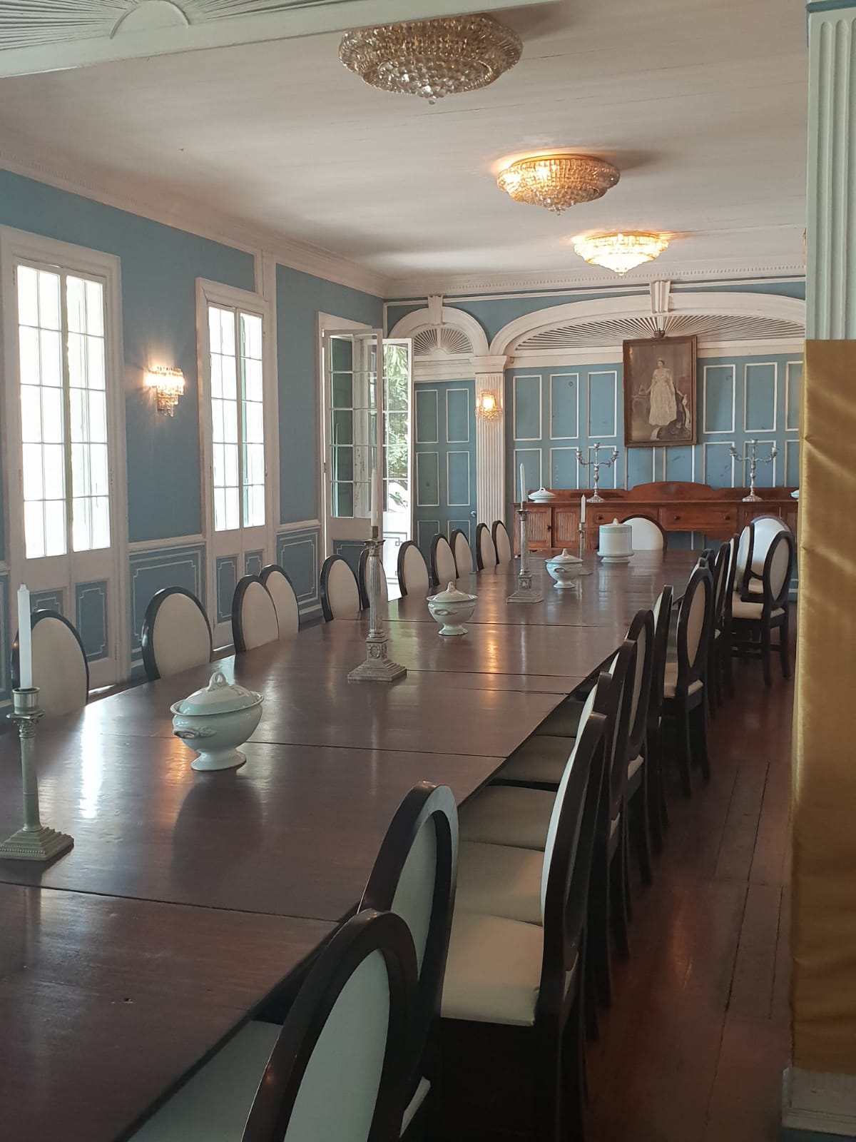 The Dining Room of the main building decorated with ceramic and porcelain wares with the Government House’s monogram