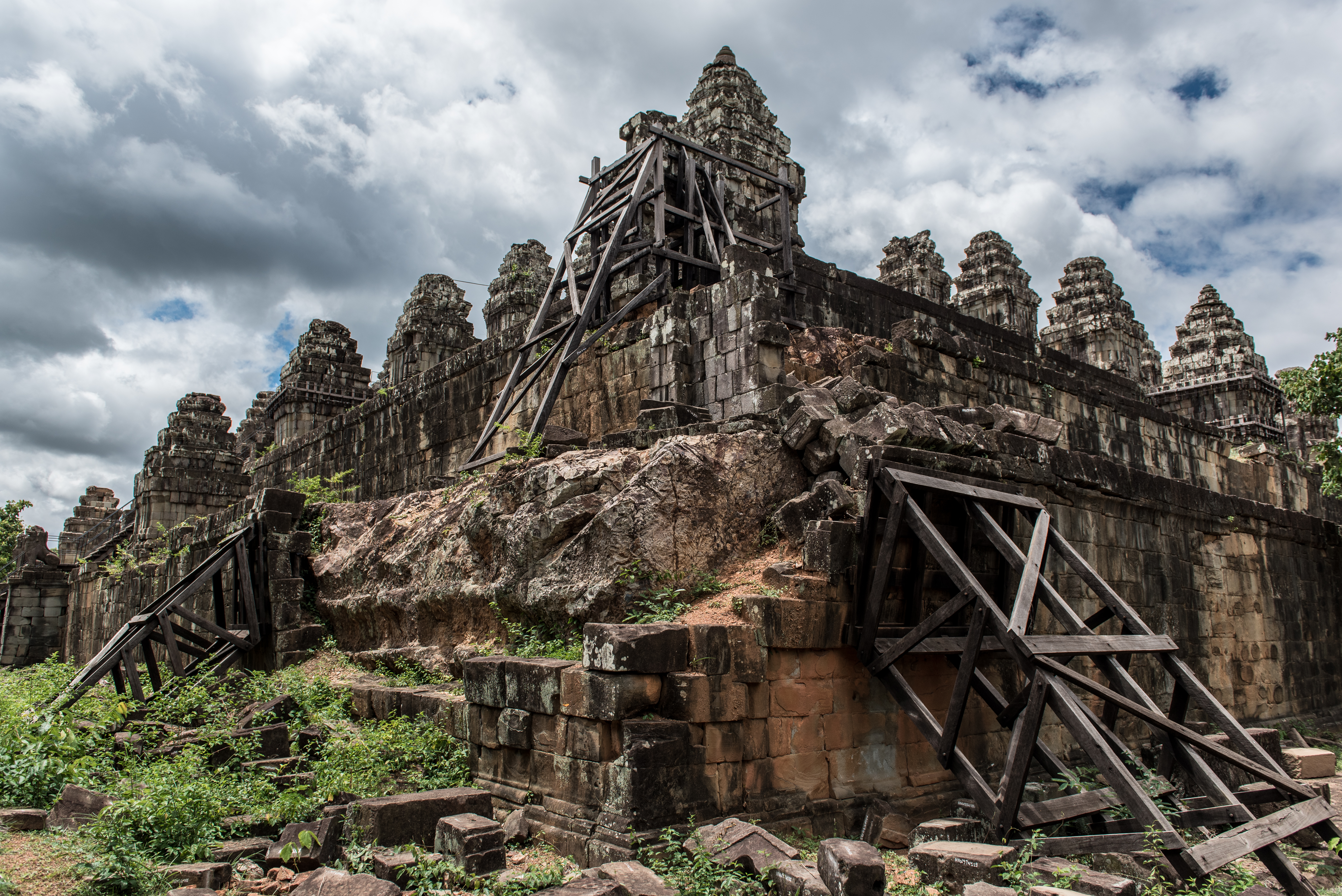 A view of the western half of Phnom Bakheng, to be restored. A view of the conserved eastern half of Phnom Bakheng. Photo by Amine Birdouz.