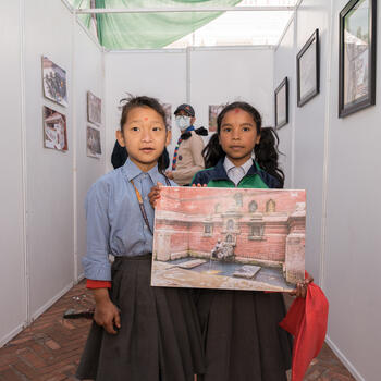 Children at the hitis photo exhibition.