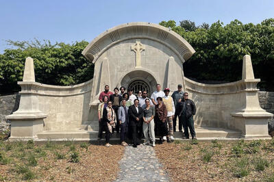 Green Wood Cemetery B2CC graduation day featuring all 2023 interns in front of restored Delafield Vault