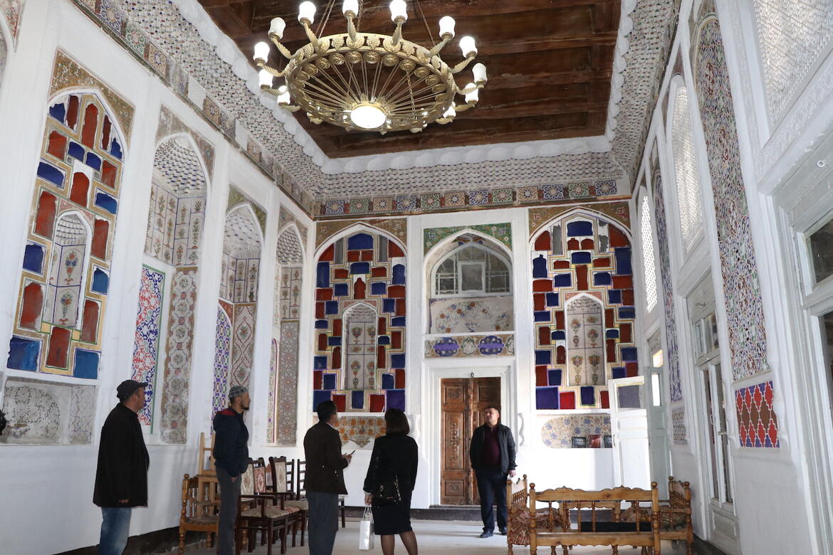 View of Watch Day participants during a visit to one of the preserved traditional Bukharian Jewish Houses in the historic center of Bukhara.