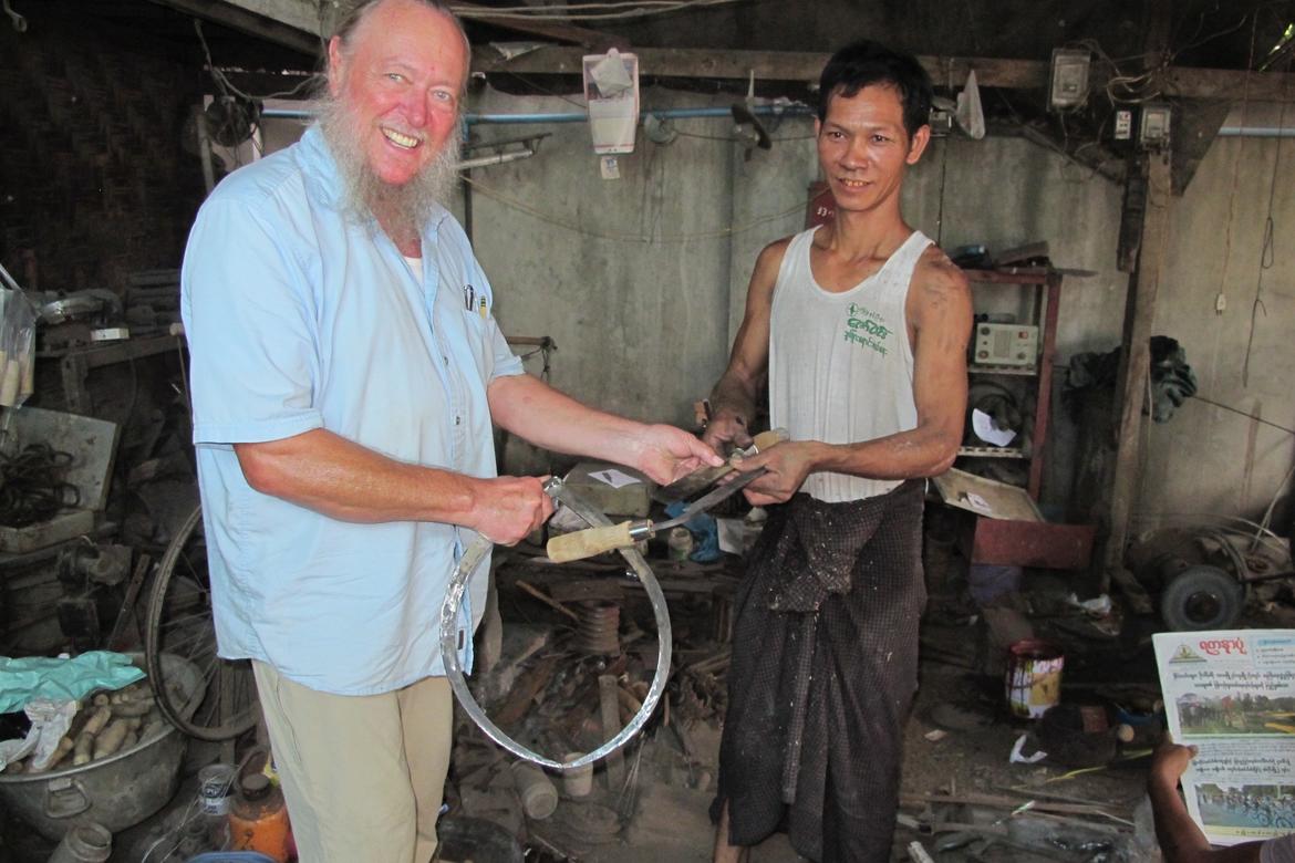 Since the master blacksmith, Than Naing Oo, spoke no English, and I spoke no Myanmar, we worked from photos and drawings. Photo by Laura Saeger.