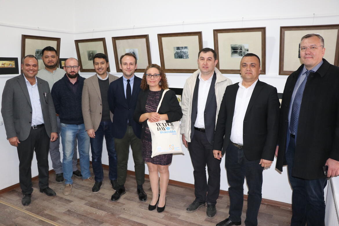 Visitors to the photography exhibition devoted to the traditional Bukharian Jewish Houses, including Deputy Mayor of Bukhara Zhomol Nasyrov; Director of IICAS Dmitriy Voyakin; project lead Dr. Ona Vileikis; WMF Program Manager Javier Ors Ausin; and representatives from UNESCO Office in Tashkent.