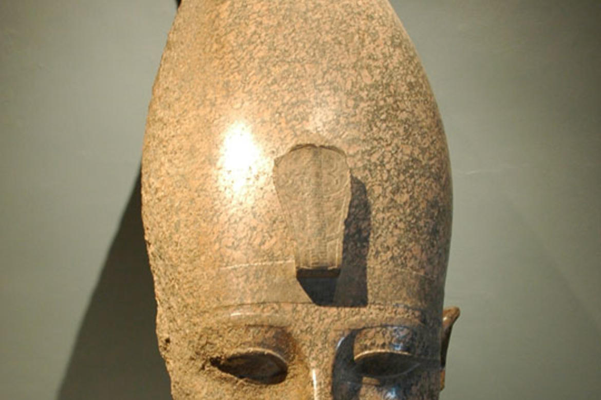The head of Amenhotep III in the Luxor Museum, before conserving the beard.