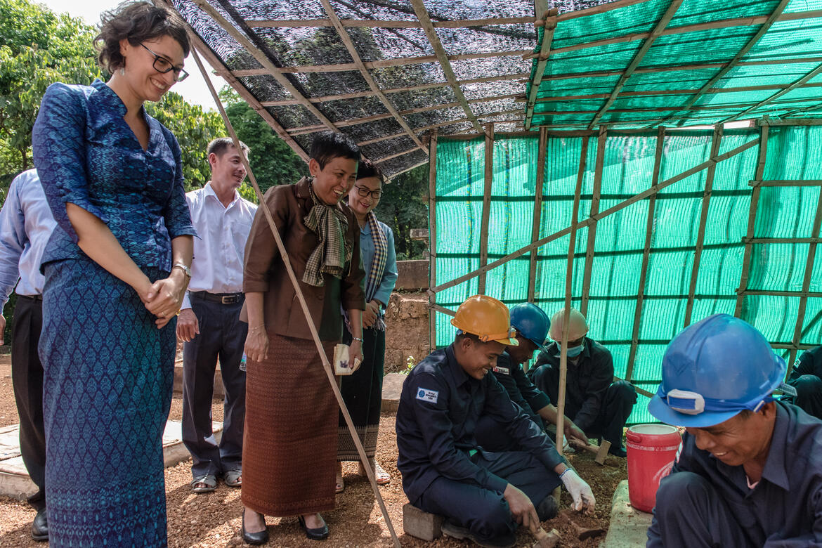 WMF's Ginevra Boatto and Her Excellency Dr. Phoeurng Sackona observe conservation work. Photo by Amine Birdouz.
