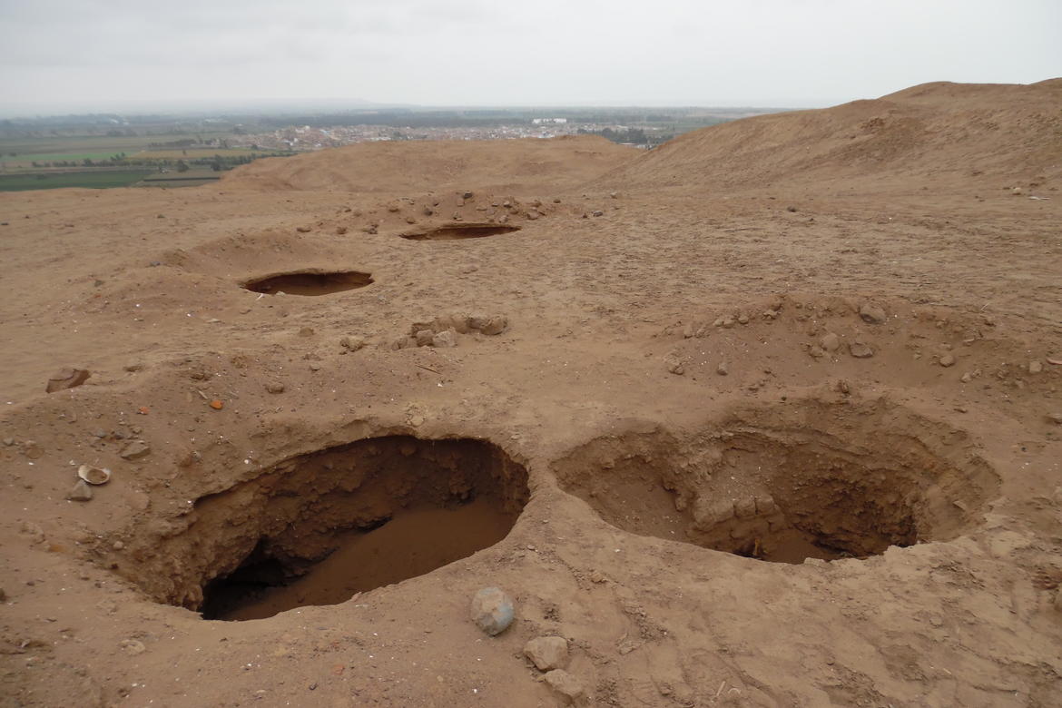 Large holes indicate looting at Cerro de Oro.