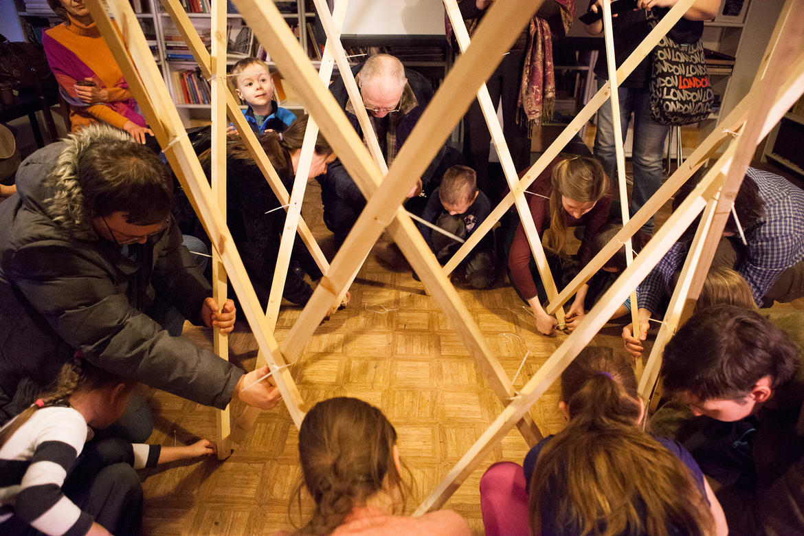 Participants assemble a model section of Shukhov Tower.