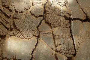 Detail of winged bearded genie, Nimrud, Iraq