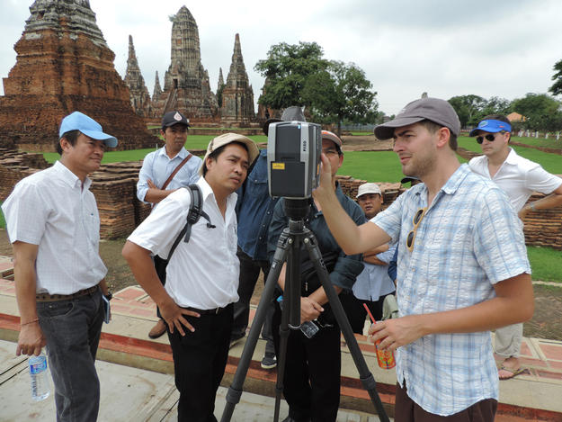Technicians from University of Florida explaining laser scanning to engineers of the Fine Arts Department of Thailand.
