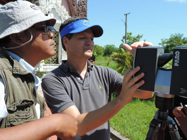 University of Florida’s Marty Hylton explains laser scanner operations to Department of Archaeology Engineer Sai Hla Myint Oo, 2014