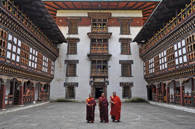 Some resident monks pose in the courtyard, 2010