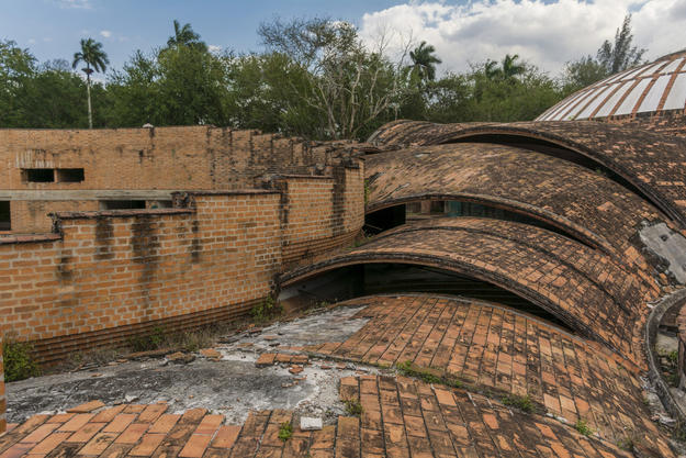 Due to exposure to the elements and insufficient maintenance, some of the brick on the roof system of the School of Ballet are falling off, 2015