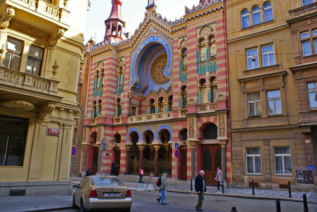 Polychrome façade of red, blue, yellow, green, and gold, 2006
