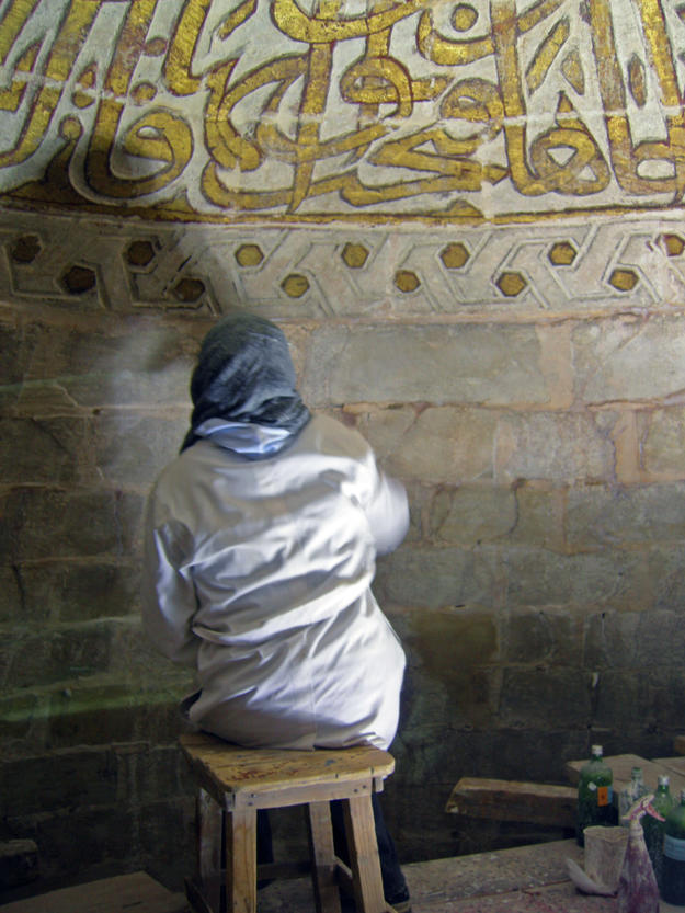 Conservator at work in the Khayrbek Complex, 2006