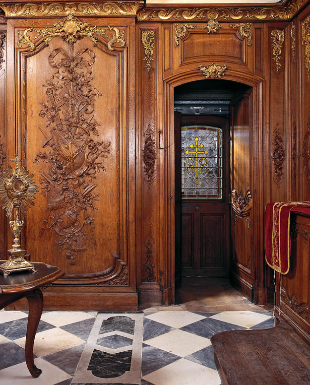 Intricate wood paneling of the sacristy , 2003