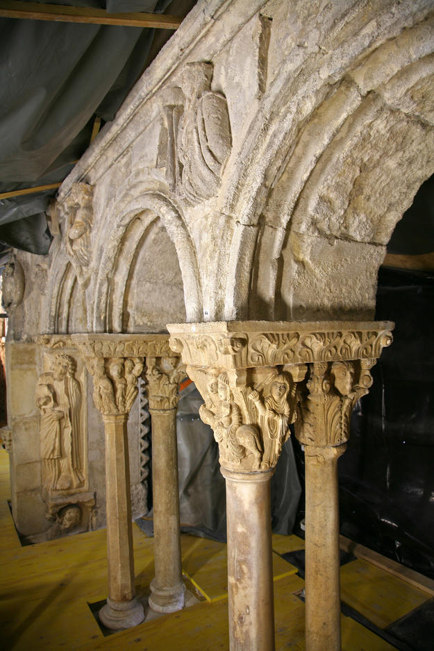 The east gallery with Romanesque bas-relief sculptures and carved capitals , 2013