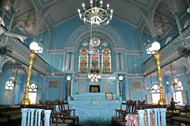 Interior with rich Burmese teakwood furnishings , 2009