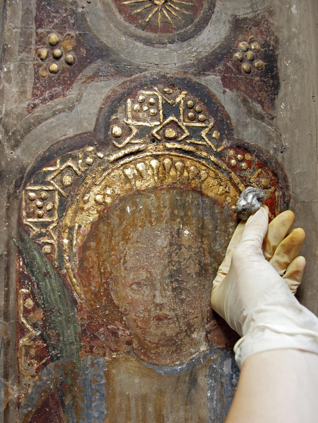Detail of a fresco during cleaning, 2013