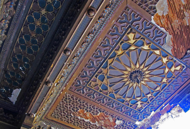 A ceiling in the Heineine Palace, decorated with geometric motifs, with the wood lath visible where the stucco has been lost, 2013