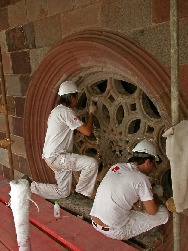 Conservators working on the stone masonry window, 2008