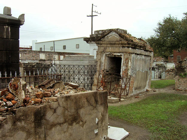 Open tomb in background with deteriorated tomb in foreground, March 2009
