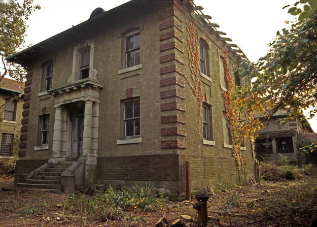 West side of the Office building after clearing and before conservation, 1997