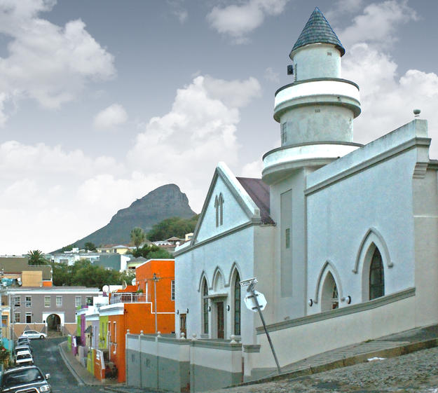 A view of Mosque Shafie, one of many mosques in Bo-Kaap, with the peak of Cape Town's Lion's Head mountain in the background, 2014