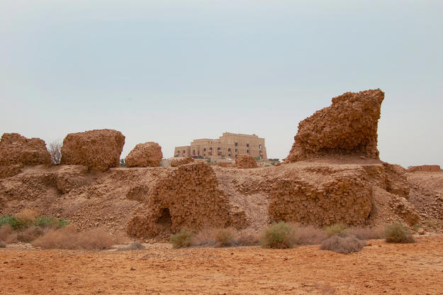 Nebuchadnezzar II's Northern Palace ruins with Saddam Hussein’s modern palace in background, 2008