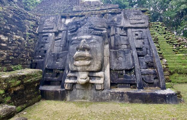 Mask Temple at Lamanai Archaeological Reserve, Belize, 2021. The structure went through five building phases and each mask stands around 4.2 meters high.