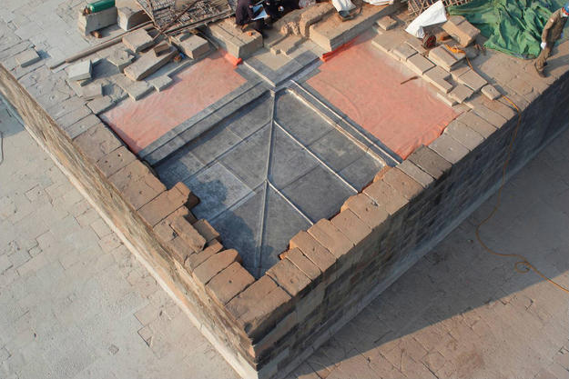 The waterproofing program used at Phnom Bakheng involves covering the foundation with a PVC membrane and, in some cases, an added layer of lead sheets.