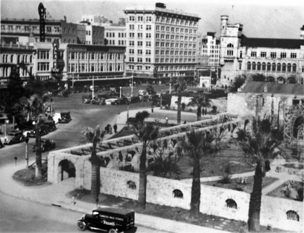 A historic view across the Alamo Plaza looking toward the northwest, ca. 1935. Photo courtesy UTSA Archives Special Collections.  