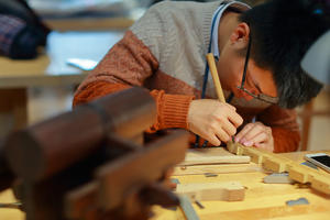 CRAFT student performing hands-on work