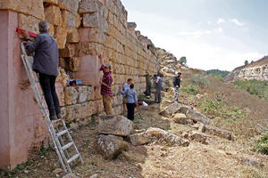 WMF and antiquities documenting sanctuary wall, August 20, 2013