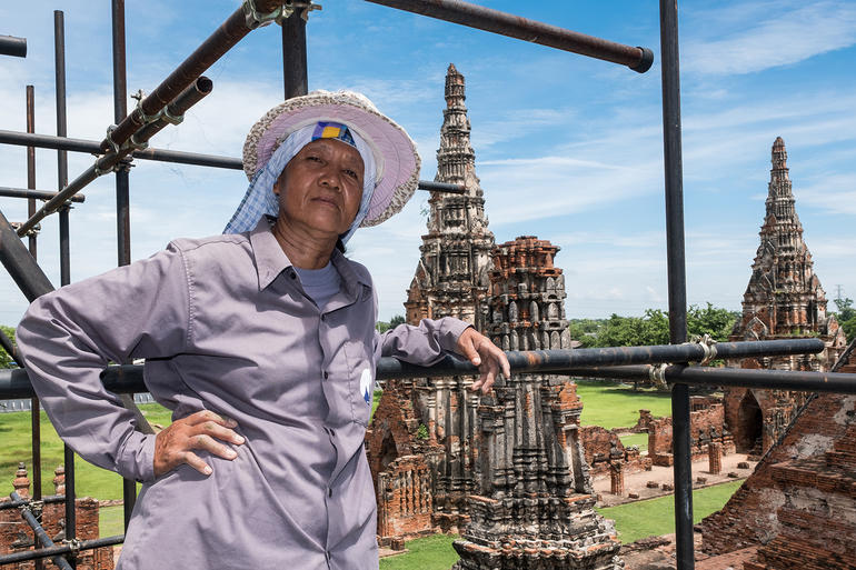 Pi Lengee poses with Wat Chaiwatthanaram’s central prang in the background.