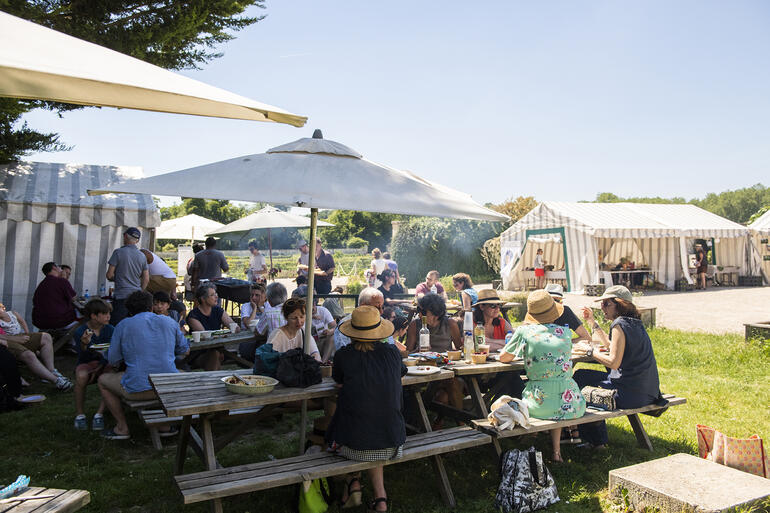 Visitors during a barbeque lunch at Watch Day Potager du Roi, 2019. 