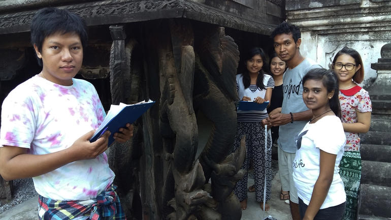 Local students help with documentation at Shwe-nandaw Kyaung, in Mandalay, Myanmar.