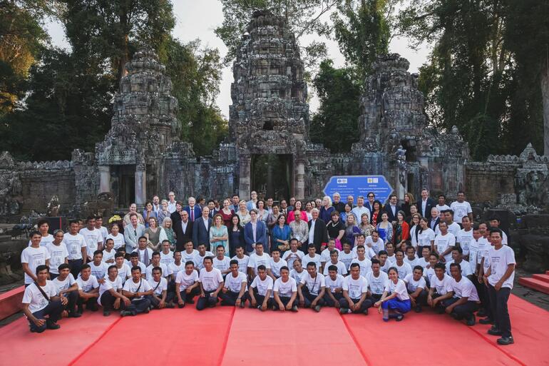 Attendees of the handover ceremony with the local staff who worked on the preservation of Angkor Archaeological Park, Cambodia.