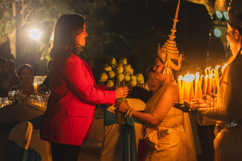 Bénédicte de Montlaur, President and CEO of World Monuments Fund, with a member of the Sacred Dancers of Angkor troupe at Angkor Archaeological Park, Cambodia.