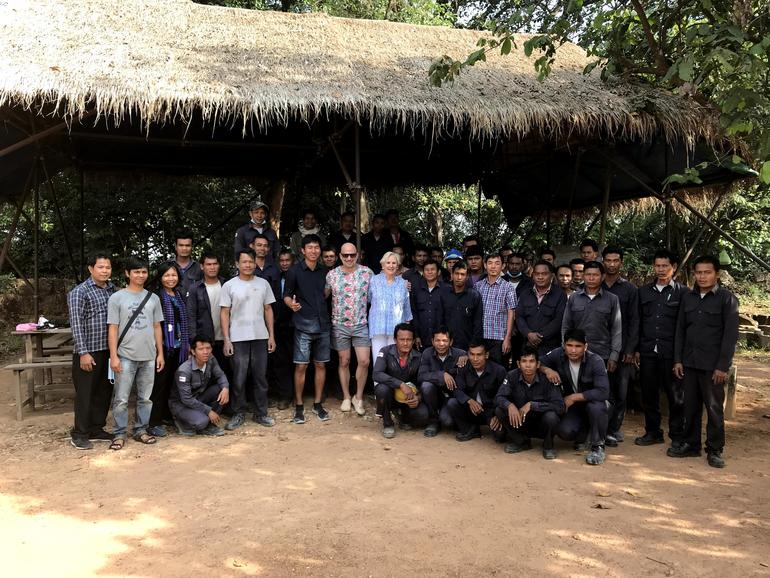 The team of skilled workers at Preah Khan with Joshua David and WMF chair Lorna Goodman, center, January 2018.