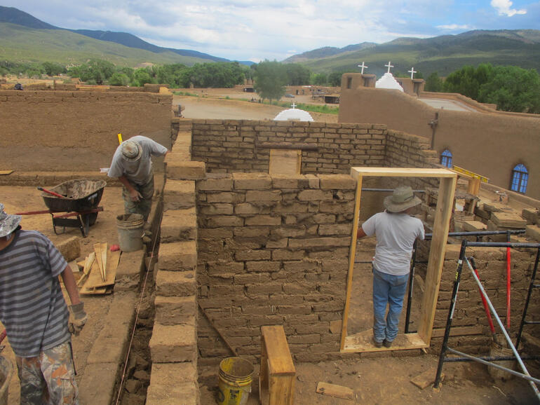 Building reconstruction at Taos Pueblo, 2011.