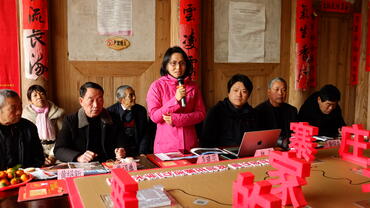 Speaker at an event held as part of Watch Day festivities at the Fortified Manors of Yongtai, China. 